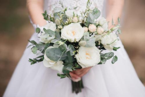 Wedding bouquet in the hands of the bride, selectoin focus